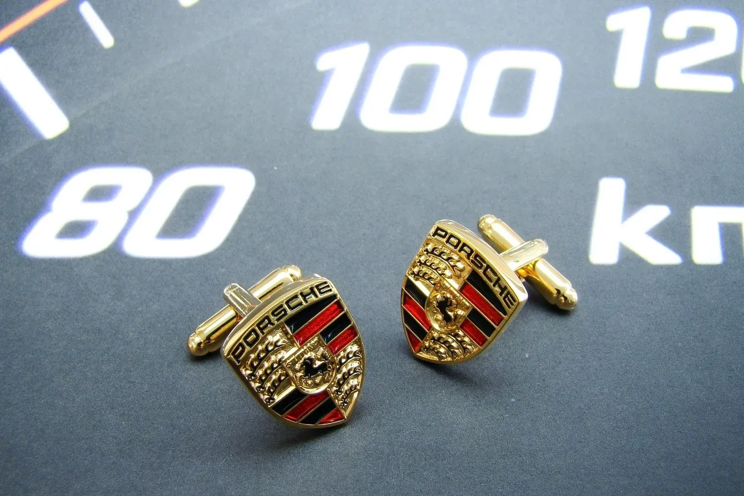 Manchetknopen Porsche logo zwart-rood-goud